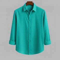 Front view of a solid aqua blue men's shirt by Shabib.