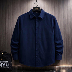 Navy blue oversized shirt with Expression tree graphic made of faces on the back, artistic streetwear design for men.