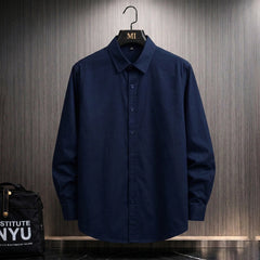 Navy blue oversized shirt with hardcore anime demon graphic and Japanese typography back print streetwear design for men