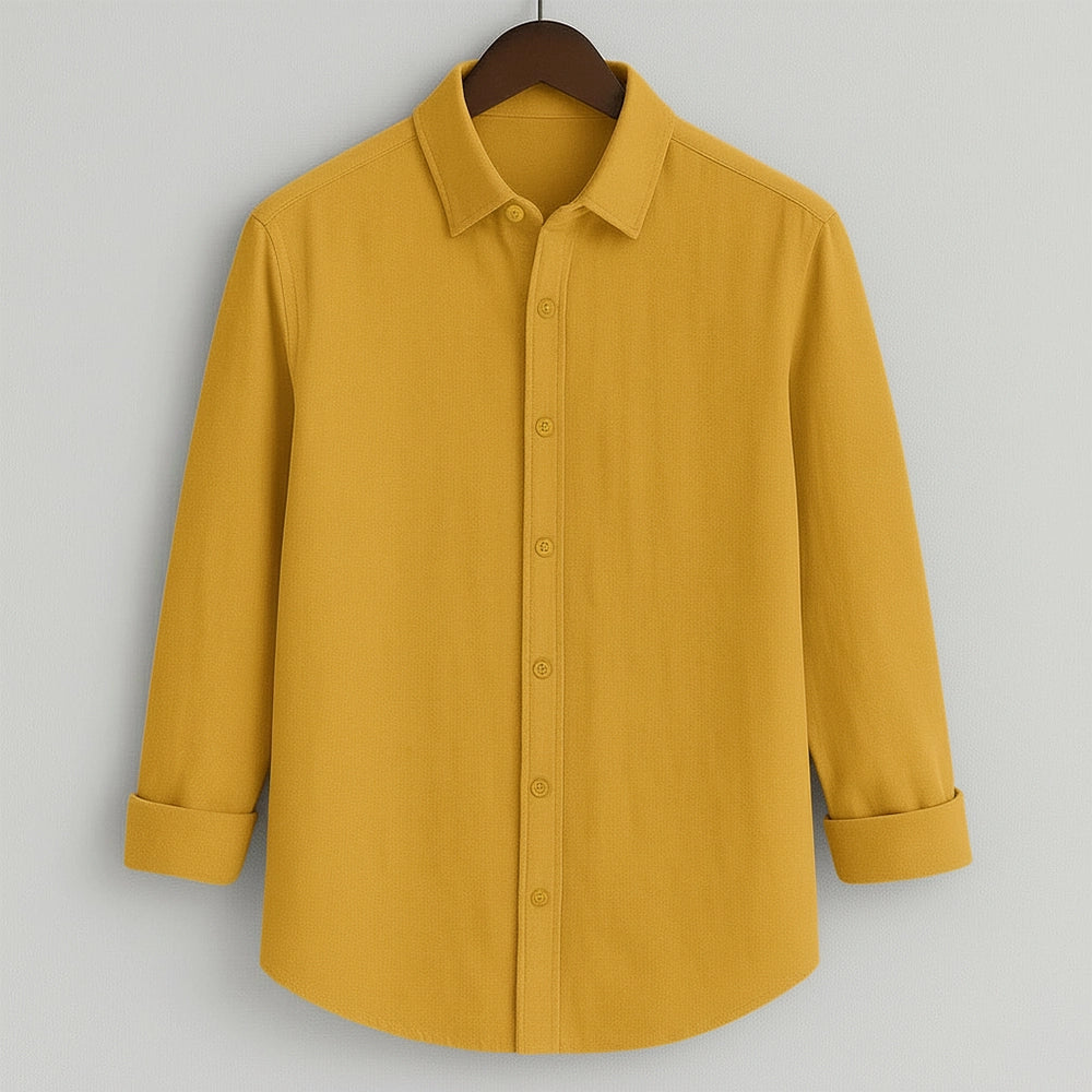Front view of a solid mustard yellow men's shirt by Shabib.