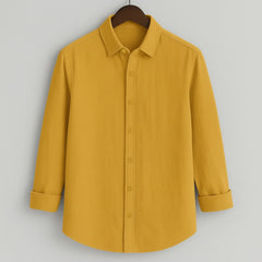 Front view of a solid mustard yellow men's shirt by Shabib.