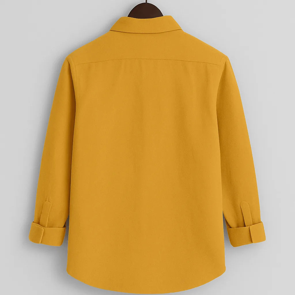 Men's mustard yellow textured full sleeve shirt, back view, hanging on a dark wooden hanger against a light grey background, showing the relaxed fit and fabric textur