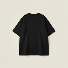 Men's black oversized t-shirt featuring a white cat doodle illustration and Karma is a cat typography.