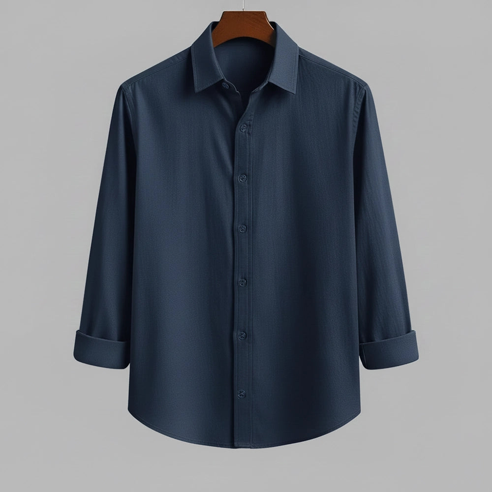 Front view of a plain, dark navy blue pure cotton shirt for men by Shabib.