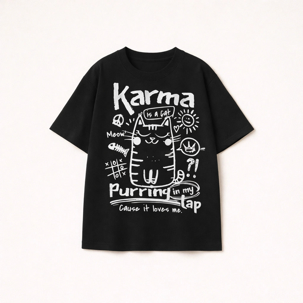 Oversized black t-shirt for men with white Karma is a cat purring in my lap doodle graphic print.