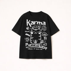 Oversized black t-shirt for men with white Karma is a cat purring in my lap doodle graphic print.