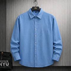 Sky blue oversized shirt with Urban Street sneaker graphic back print streetwear design for men.