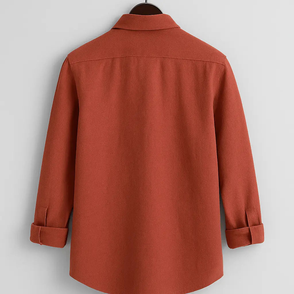 Men's burnt orange textured full sleeve shirt, back view, hanging from a wooden hanger against a white background, showcasing the relaxed fit.