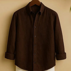 A dark brown long-sleeved men's casual shirt with a button-down collar, displayed from the front.