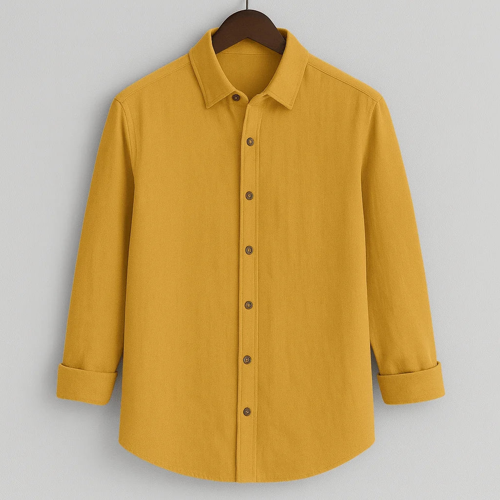 Men's mustard yellow textured full sleeve shirt, front view, hanging on a dark wooden hanger against a light grey background