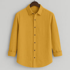 Men's mustard yellow textured full sleeve shirt, front view, hanging on a dark wooden hanger against a light grey background