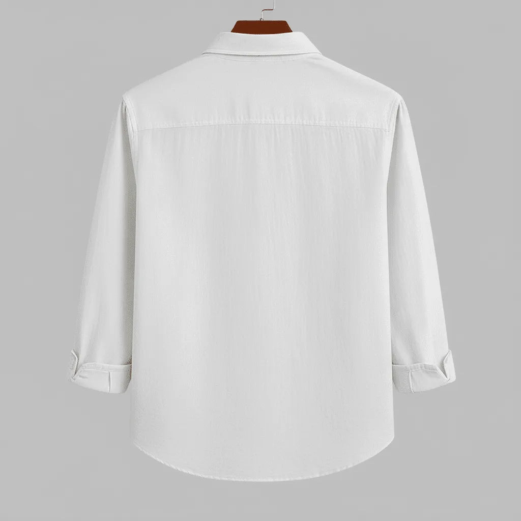 Men's pure white textured full sleeve shirt, back view, hanging on a dark wooden hanger against a light grey background, showcasing the fabric texture and relaxed fit.